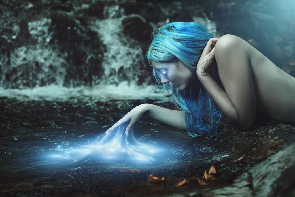 River nymph with magical water energies . Fantasy and myth