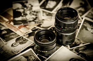 Photographs and old camera lens